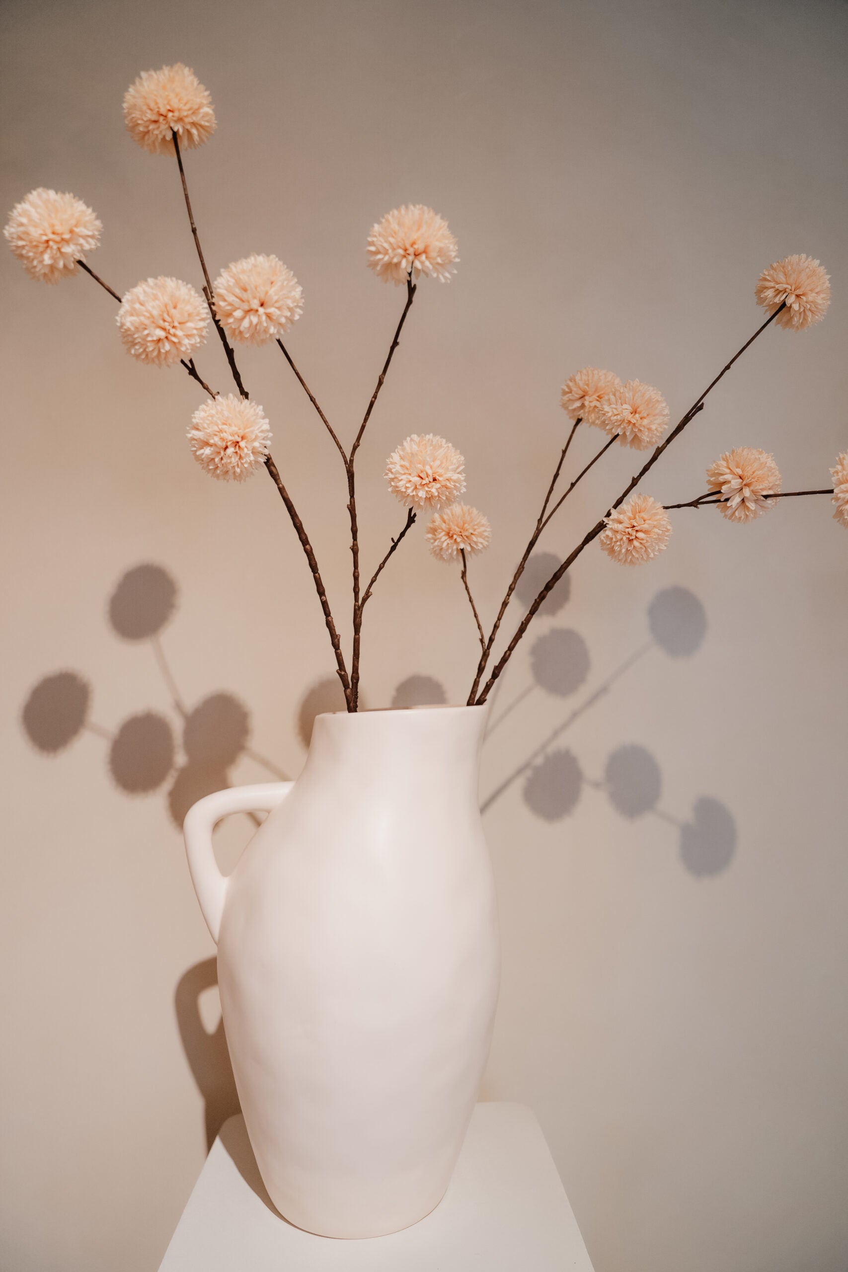 Artificial branch pompom spray L Cream